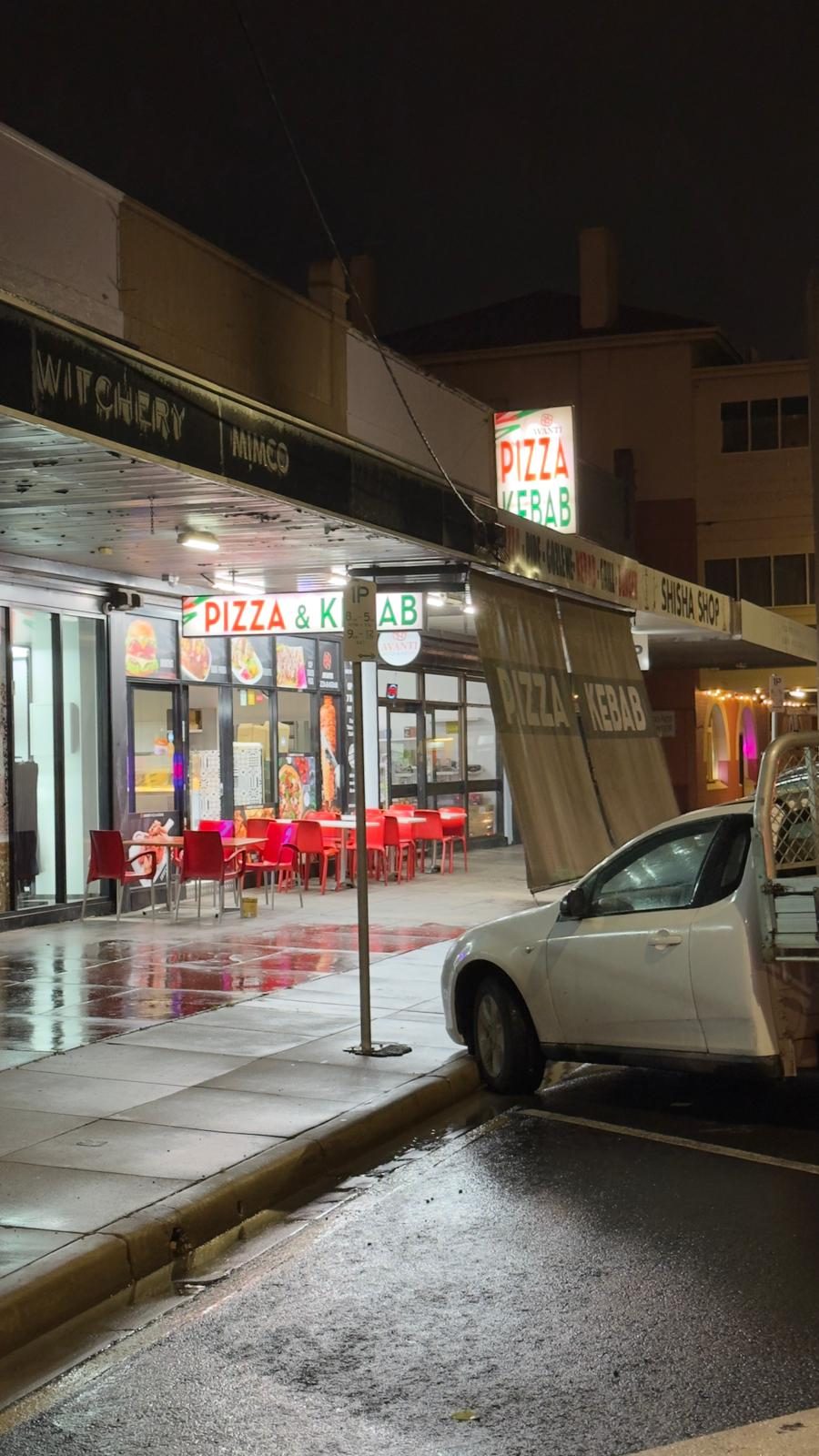 Avanti Pizza & Kebab lit up at night